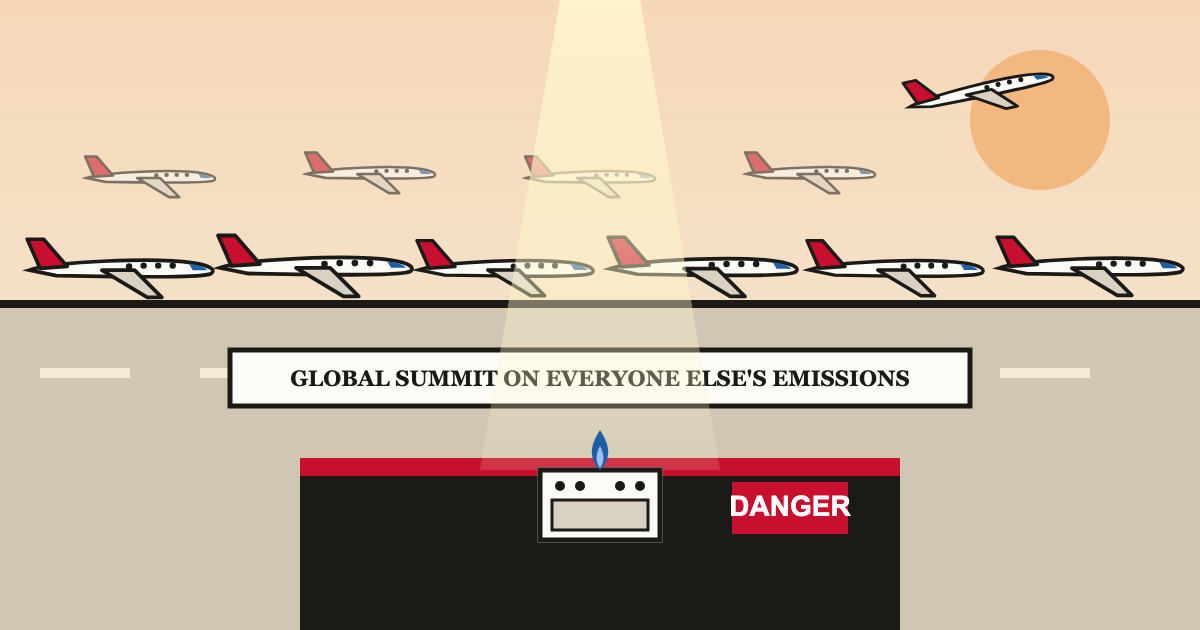 Private jets lined up on a runway while a lone gas stove sits under a spotlight on a summit stage